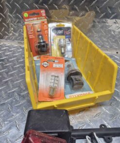 LED and headlight bulbs and large yellow parts bin