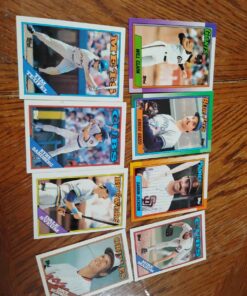 8 baseball cards including Will Clark