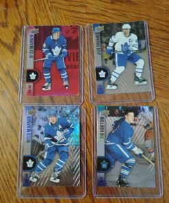 Qty 4 Tim Hortons / Toronto Maple Leafs hockey cards with protective sleeve