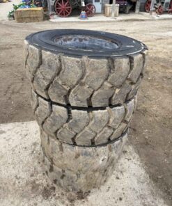 set of 4 skid steer tires 12-16.5 on rims