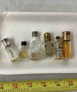 6 assorted perfume bottles, some with perfume