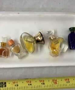 5 assorted perfume bottles some with perfume