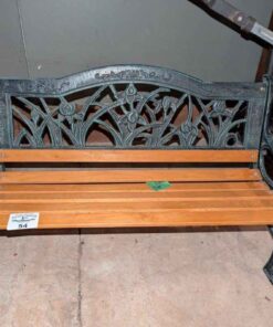 Small decorative cast garden bench