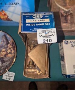 Inside vintage door set and brass triangle plates