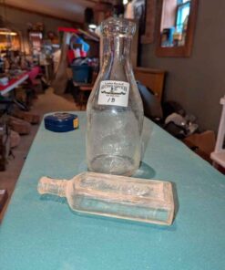 Raleigh's medicine and Pallesen's Dairy Bottles
