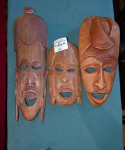 Trio of wood carved wall masks