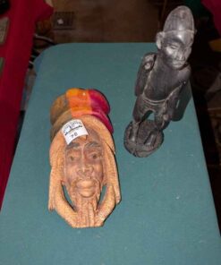 Wall mask and stone carving