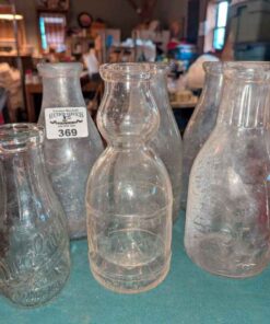 Quality, Company, Crescent and assorted Dairy bottles