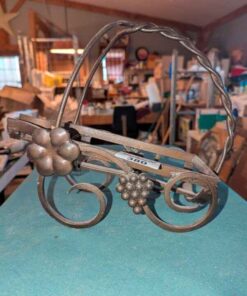 Metal wine bottle holder