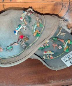 Assorted pins and hats