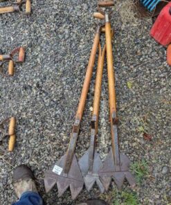 Three antique hay cutters