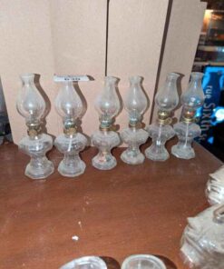 Six miniature oil lamps
