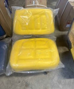 Unused yellow tractor suspension seat