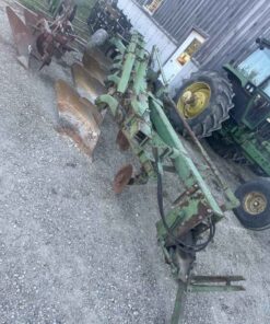 John Deere 2500 , 4 furrow plow 18in