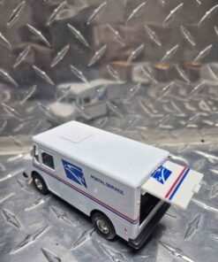 Diecast pullback action pulls postal truck with opening rear door