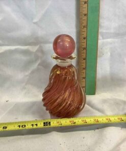 Cranberry and swirled gold vase with stopper