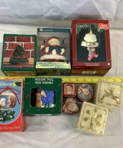 Assorted candles, stocking hanger, tree decorations & more.