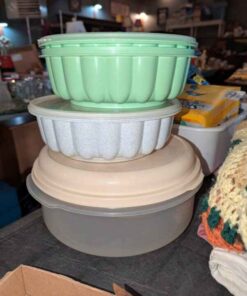 Assorted plastic molds and food storage container