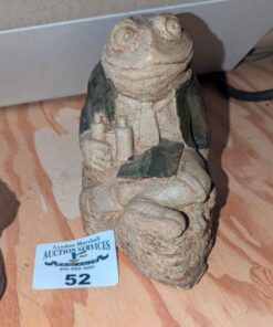 Frog with binoculars statue