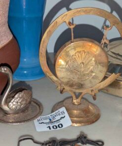 Brass dinner gong and swan ring holder