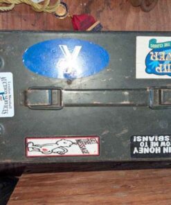 Steel ammunition box with assorted stickers