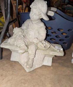 Boy on a bench cement Figure