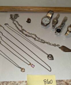 Assorted necklaces, Boy scout pin, wrist watches, etc