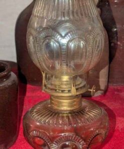 Amber glass Zipperloop Oil lamp C. 1900s