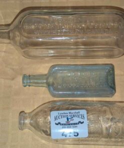 Trio of collectible bottles