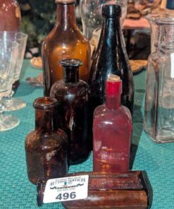 Douglas' Egyptian Liniment, Bovril amber and assorted glass bottles