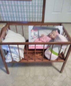 Wooden crib and Doll