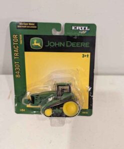 1/64th scale John Deere 8430T track tractor- produced in 2006. New in the package