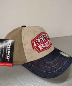 This kid has been raised red ball cap