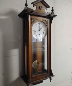 Silent Westminster German made wall clock approx 30 in high x 11.5 in wide