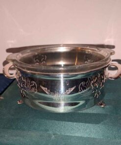 Silver plated serving cradle with glass insert