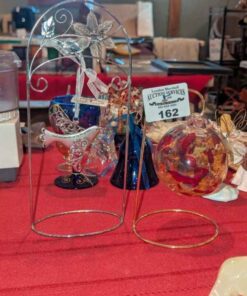 Pewter bird and blown glass orb ornamentals