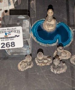 Metal Light house statues and etched cube