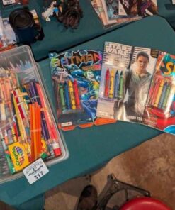 Crayons with activity books, pencil crayons, etc