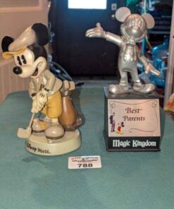 Mickey Mouse Golfer and Magic Kingdom statues