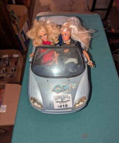 Barbie dolls and convertible