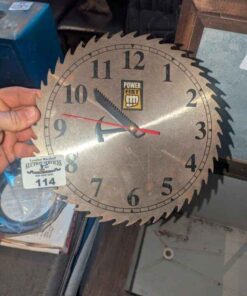 Power fist circular saw blade clock