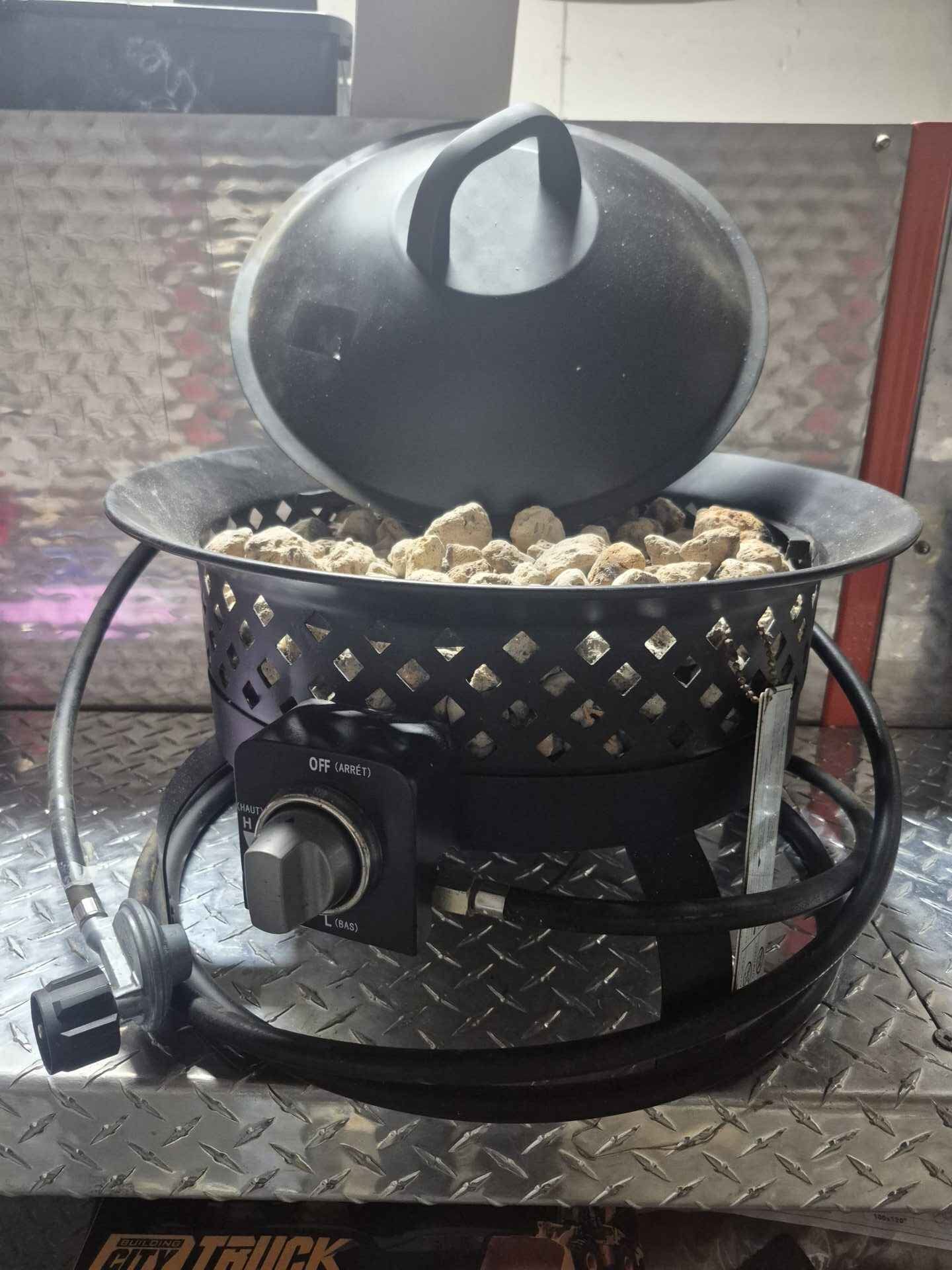 Propane fire pit with stones