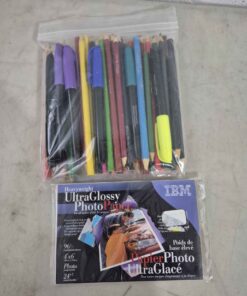 Assorted penns, marker's e t c and glossy paper
