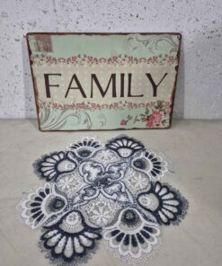 Tin family sign and doily