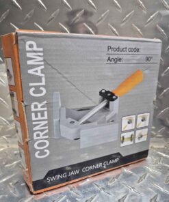 Swing jaw corner clamp
