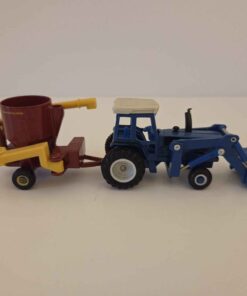 1/64 - Ford 8730 Tractor with Loader and New Holland Mix Mill - Loose/No Box - Made by ERTL