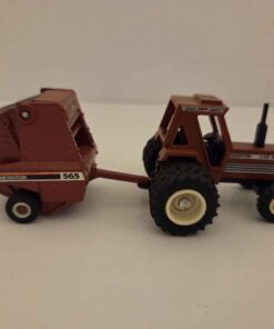1/64 - Hesston 130-90 Tractor with Duals and Hesston 565 Round Baler - Loose/No Box - Made by ERTL