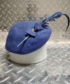 blue beret with feather