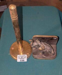 Brass paper towel holder and elephant book end