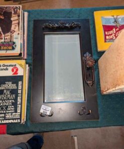 Accent wall mirror and hanger